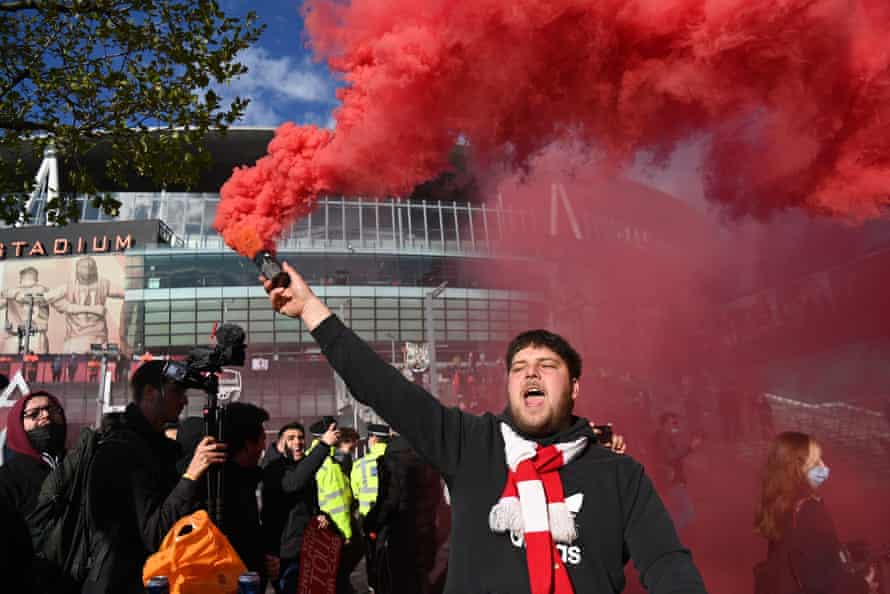 Arsenal fans protest against owner Stan Kroenke outside the Emirates Stadium