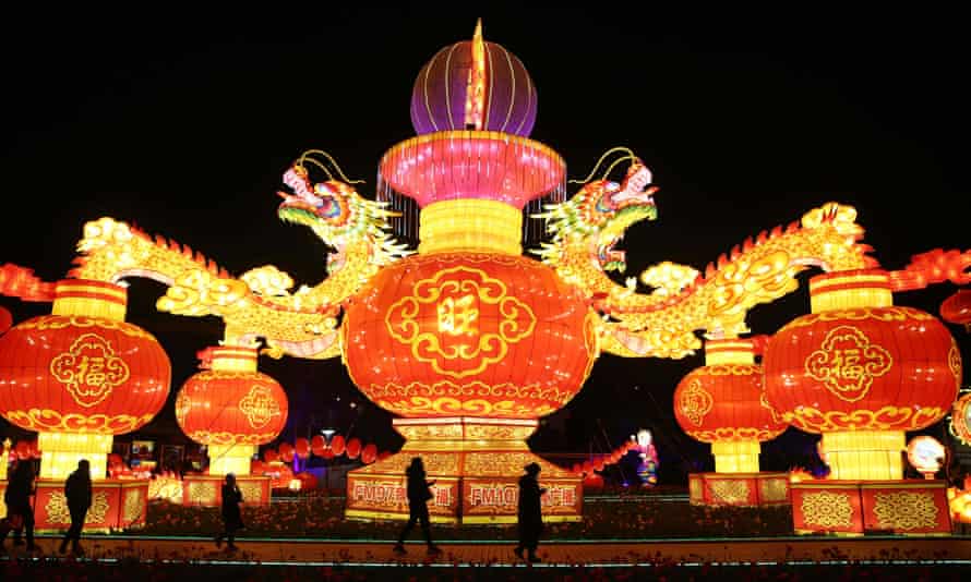 Tourists watch a light show at World Horticultural Expo Garden in Kunming, China.