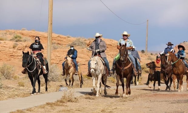 Allie Young, left, with a group of Native Americans, riding on horseback to the polls in 2020. usa,us , arizona,Allie Young,Kyrsten Sinema,Democrat from Arizona, Channel Powe,harbouchanews