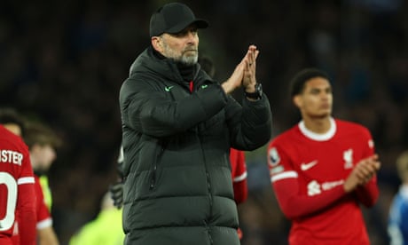 The Liverpool manager, Jürgen Klopp, applauds fans at full-time against Everton.