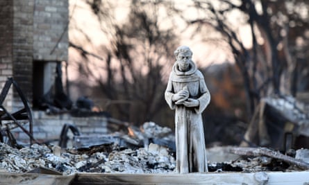 A statue remains at a burned out property in Santa Rosa, California.