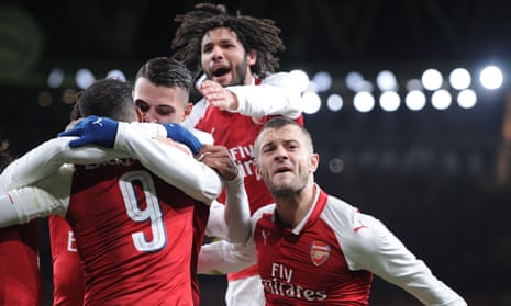 Jack Wilshere, right, leads the celebrations after Granit Xhaka’s strike which secured Arsenal’s place in the Carabao Cup final. 