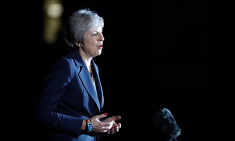Theresa May gives a statement outside 10 Downing Street after the marathon cabinet meeting