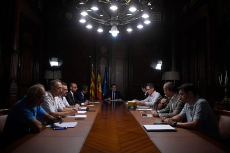 Spanish Prime Minister Mariano Rajoy (C) speaks during a meeting following the attack of Barcelona where a van ploughed into the crowd, killing 13 persons and injuring over 80 on the Rambla in Barcelona, on August 17, 2017. A driver deliberately rammed a van into a crowd on Barcelona’s most popular street on August 17, 2017 killing at least 13 people before fleeing to a nearby bar, police said. Officers in Spain’s second-largest city said the ramming on Las Ramblas was a “terrorist attack”. / AFP PHOTO / LLUIS GENELLUIS GENE/AFP/Getty Images