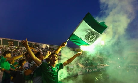Fans pay tribute to Brazilian football team Chapecoense following a fatal plane crash in which most of the team was killed.