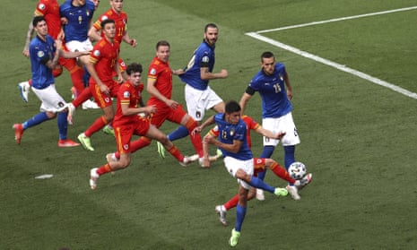 Italy’s Matteo Pessina, foreground, scores his side’s only goal.
