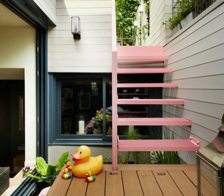 The couple chose perforated steel stairs to maximise natural light.