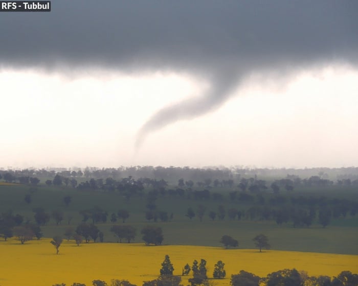 Tornado in central NSW and flood rescues in Sydney as wild weather soaks state
