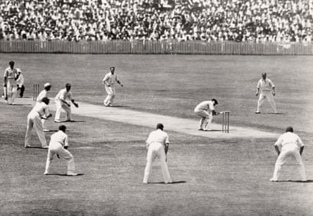 Australian captain Bill Woodfull ducking under a short ball from Harold Larwood of England surrounded by a cordon of leg-side fielders during the first match of the Bodyline Test series between Australia and England at the Sydney Cricket Ground, circa December 1932. England won the series and the Ashes 4-1