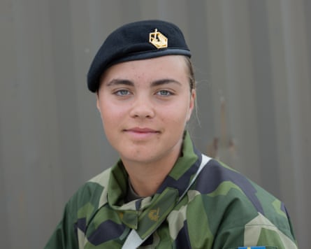 Ella Adman in military beret and camo shirt
