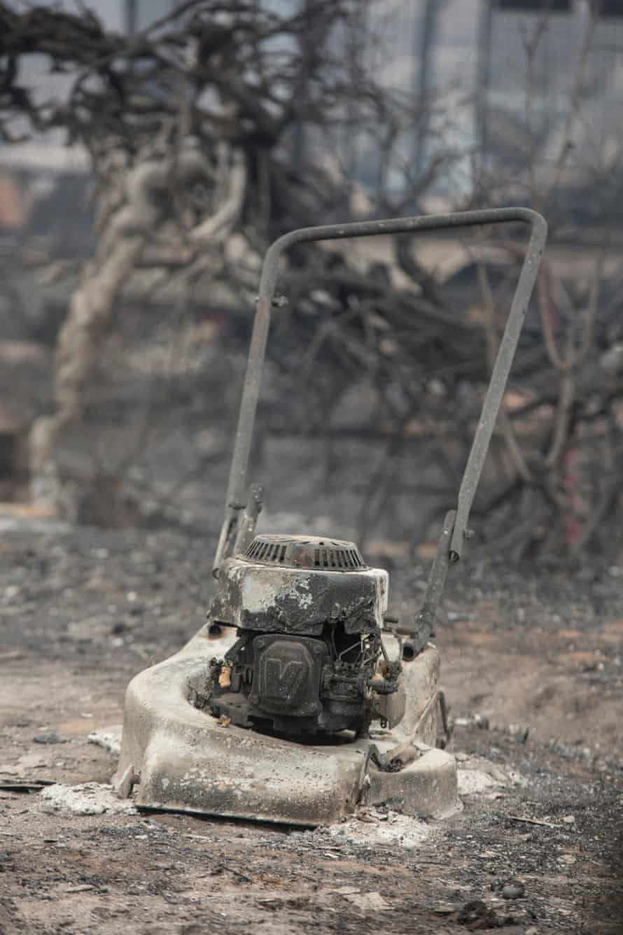A burnt lawn mower at destroyed by burnt out houses on Railway Parade, Wingello.