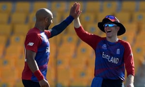 Tymal Mills celebrates one of his three wickets with captain Eoin Morgan.