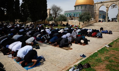 Muslim worshippers attend the Friday prayers during the holy fasting month of Ramadan, on the Al-Aqsa compound, also known to Jews as Temple Mount, amid the ongoing conflict between Israel and the Palestinian Islamist group Hamas, in Jerusalem's Old City.