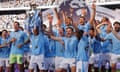 Manchester City’s players lifting the Premier League trophy