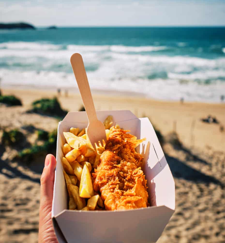 Box of delights: fish and chips with a view of the beach.