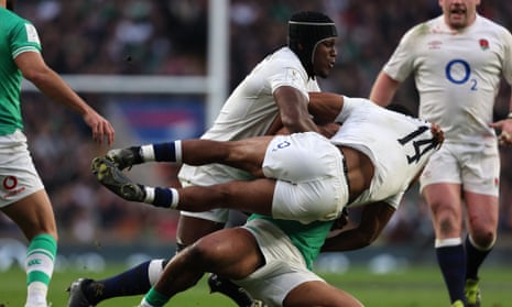 Ireland's centre Bundee Aki tackles England's wing Immanuel Feyi-Waboso during their recent Six Nations match.