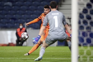 Juventus' Alvaro Morata tries a shot on goal but is blocked by Porto goalkeeper Agustin Marchesin.