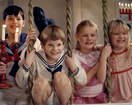 Bertil Guve (left) and Pernilla Allwin (second right) / in Fanny and Alexander.
