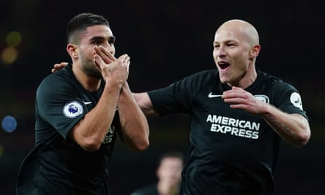 Neal Maupay celebrates scoring the second Brighton goal with Aaron Mooy.