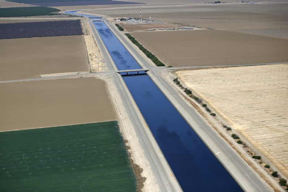 The California aqueduct and farm fields are seen in the Central Valley. The agriculture industry uses the vast majority of California’s water.