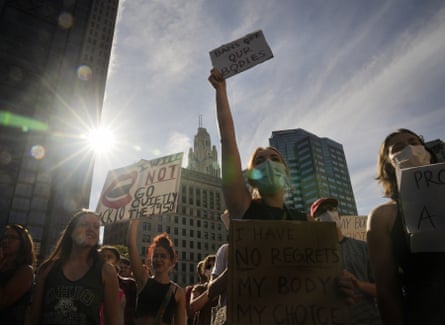 Protesters rally astatine the Ohio statehouse and march downtown successful enactment of termination aft the ultimate tribunal overturned Roe v Wade connected 24 June 2022.
