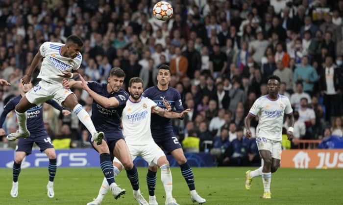 Real Madrid in final after Rodrygo and Karim Benzema stun Manchester City | Champions League | The Guardian