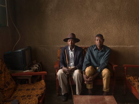 Celestin Kayijuka (on left), whose father was killed by Jean Marie Mukyemrwari (on right) in the Rwandan genocide