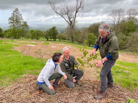 two walkers and a natural beauty wardens in the countryside