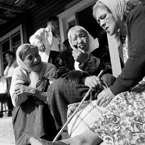 three old ladies sit together