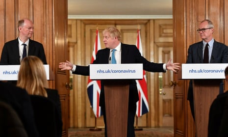 Chief medical officer Chris Whitty and chief scientific adviser Patrick Vallance flank Boris Johnson at a Covid press conference on 19 March, 2020.