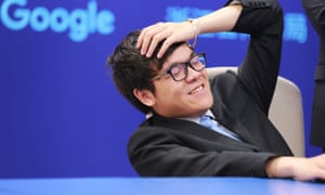 Chinese Go player Ke Jie reacts during his second match against Google’s artificial intelligence program AlphaGo.