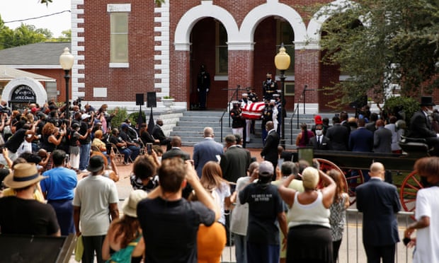 The casket of late John Lewis is carried outside the Brown Chapel AME Church, in Selma, Alabama.