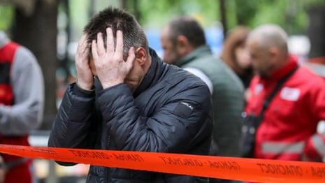 Police cordon off Belgrade school after pupil opens fire, killing nine people – video