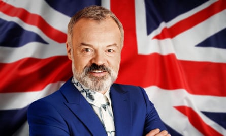 Graham Norton poses in front of the Union flag