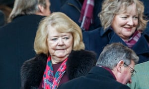 Hearts owner Ann Budge standing in the crowd at a football match.