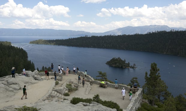 Visitors view Emerald Bay on the west shore of Lake Tahoe, near South Lake Tahoe, California, 8 August 2017.