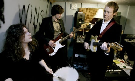 Parker, left, and her husband, Alan Sparhawk, right, with the Low bassist Matt Livingston in the couple’s basement in Duluth in 2007.