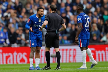 Reece James remonstrates with referee, Darren England, during the FA Cup final.