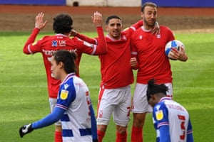 Glenn Murray of Nottingham Forest celebrates with teammates Anthony Knockaert and Filip Krovinovic.