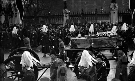 A black and white photo of guardsmen accomapnying a flat open carriage with a casket on top past throngs of crowds
