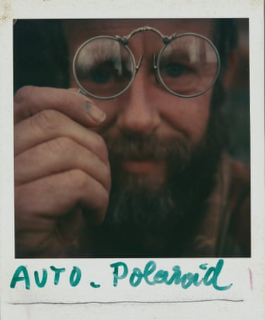 ‘Auto-Polaroid’, c. 1972–1979. Van der Elksen seen staring into the camera lens through a pince nez. Polaroid has been signed with the title