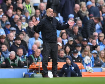 Manchester City manager Pep Guardiola reacts during the English Premier League match