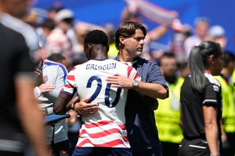 Folarin Balogun is hugged by Pocchetino