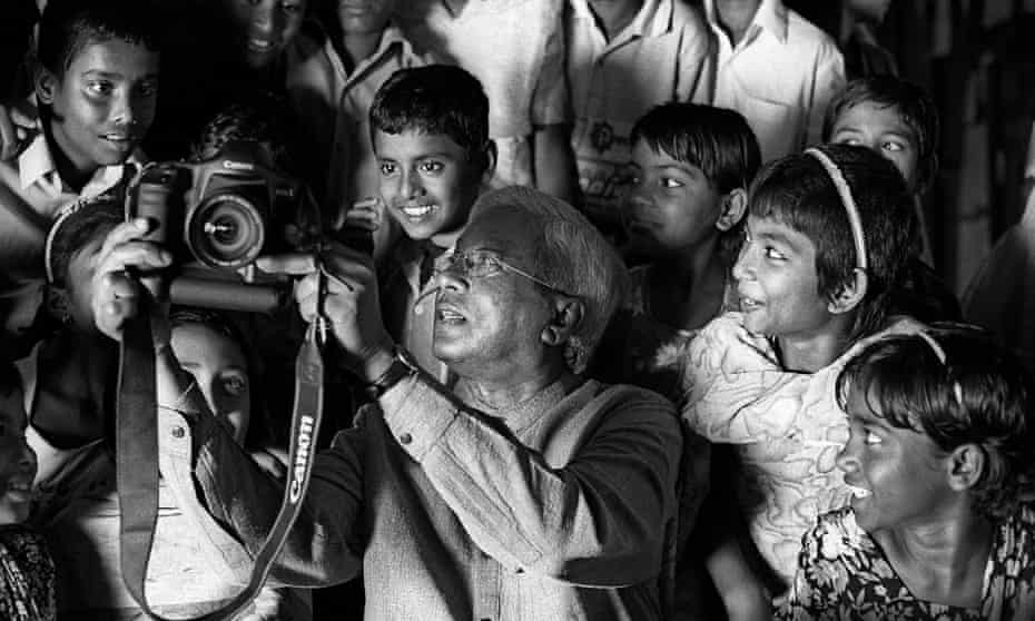Sir Fazle Hasan Abed gave up a job as an executive with Shell to tackle poverty in Bangladesh. Here he is seen visiting a Brac school in 2004.