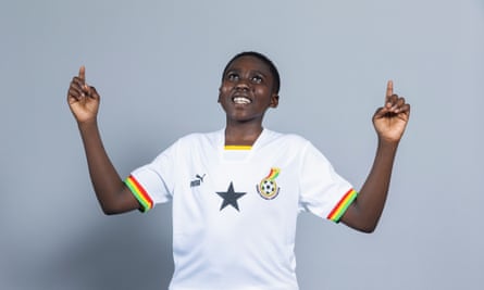 England’s united nations of football: 32 teams, one World Cup – and a lot of excited kids | World Cup 2022 18 Benedith Gyanfiduah wearing a white Ghana shirt with both arms held up and looking up to the heavens