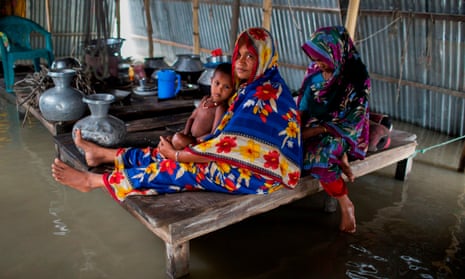 A flood-affected family in Kurigram, Bangladesh on 26 July 2019. ‘Poorer countries, which broadly speaking are the least to blame for the climate crisis, will suffer most.’