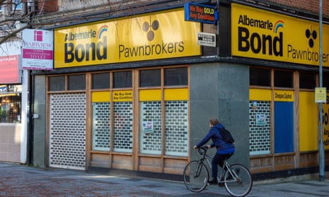 A pawnbrokers to let in Slough, Berkshire. The IFS said it was unlikely the economy would perform as well as the independent OBR predicted in its forecasts.