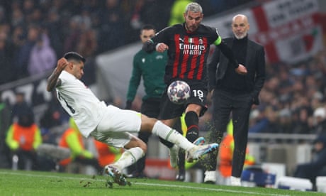 Spurs’ Cristian Romero tackles Théo Hernandez