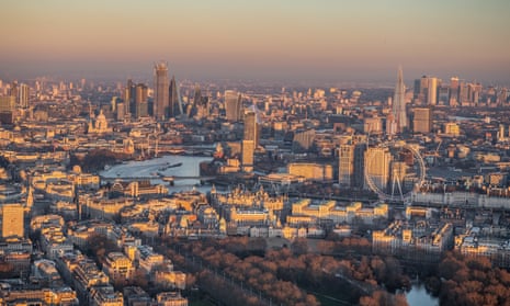 Sunset over Whitehall, aerial view, with Southbank and City of London