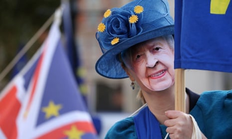 An anti-Brexit protester wearing a mask of the Queen last month.